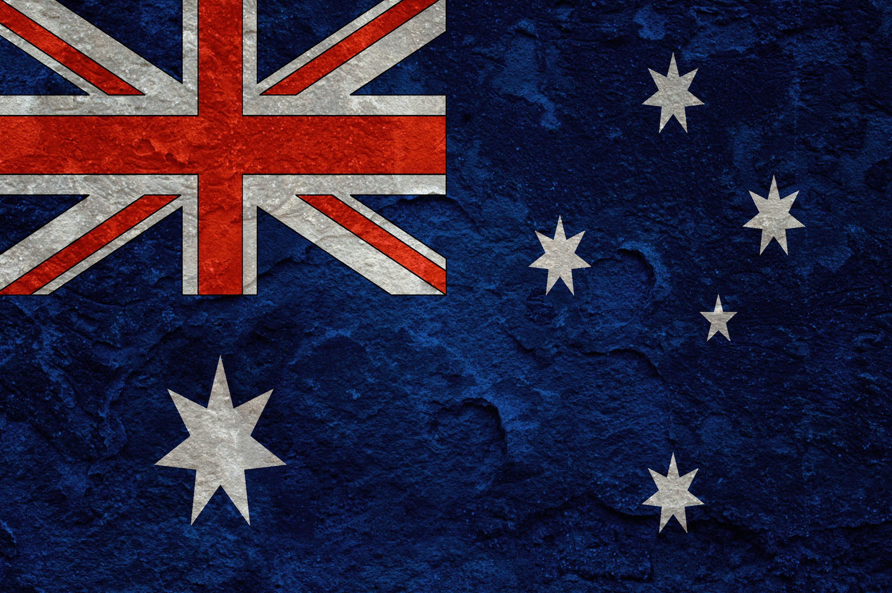 Australia flag on grunge concrete wall background